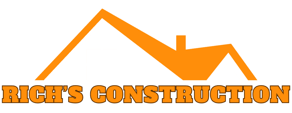 The image features the logo for "Rich's Construction" with the company name written in bold, orange, uppercase letters. Above the text is a stylized orange house roof with a window and small chimney, reflecting their expertise in Roof Replacement Long Island. The background is a light brown color.